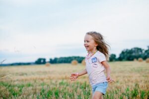 carefree child enjoyment field